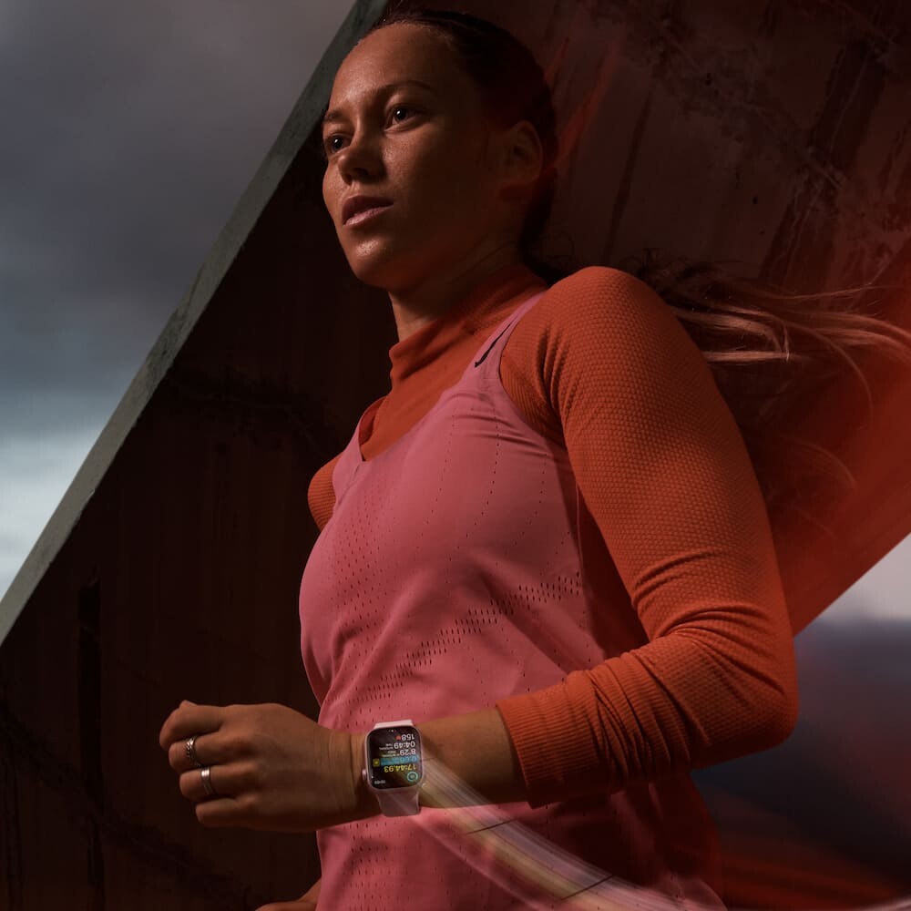A lady running with Apple Watch Series 9 on her wrist