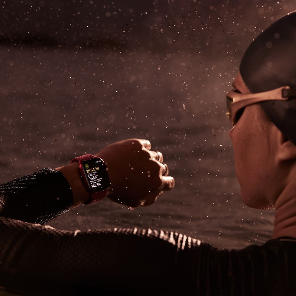 A lady swimmer checking time on Apple Watch Series 9
